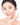 Image of a female model placing Antu Brightening Night Cream on her cheek.