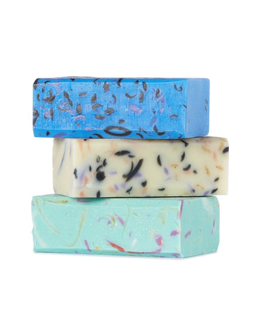 Three bars of soap stacked on top of one another.